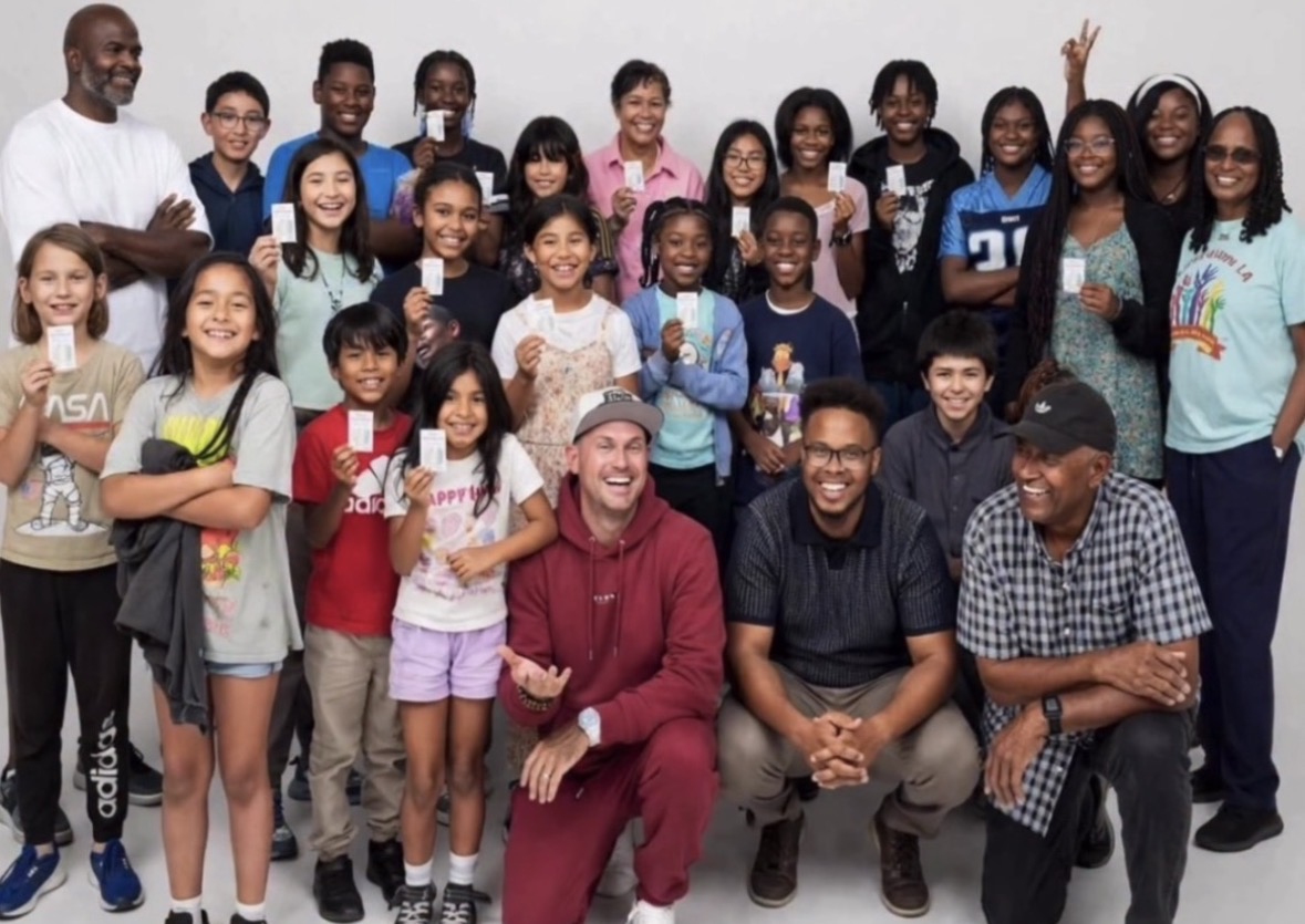 James Jordan with a diverse group of young golfers and mentors